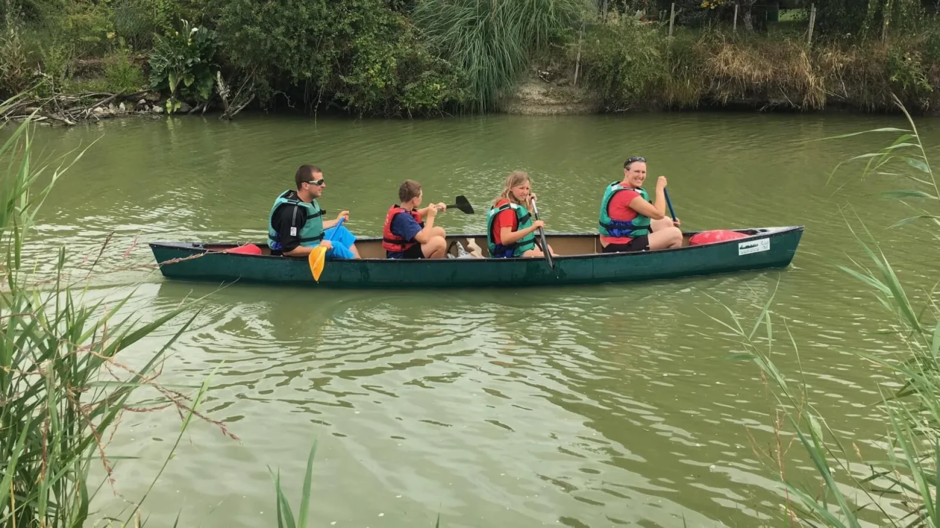 Family canoeing in the marshes in Vendée